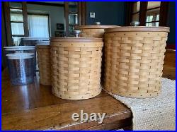 LONGABERGER CANISTER SET of 4 COMPLETE WITH LIDS AND LIDDED PROTECTORS