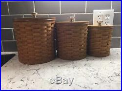 Longaberger Canister Set of Three with inserts. Slightly used condition