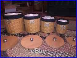 Set Of 4 Longaberger Basket Canisters With Wood Lids & sealed protectors & Used