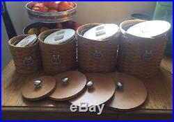 Set Of 4 Longaberger Basket Canisters With Wood Lids, sealed protectors & tie on