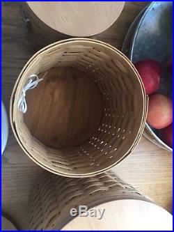 Set Of 4 Longaberger Basket Canisters With Wood Lids, sealed protectors & tie on